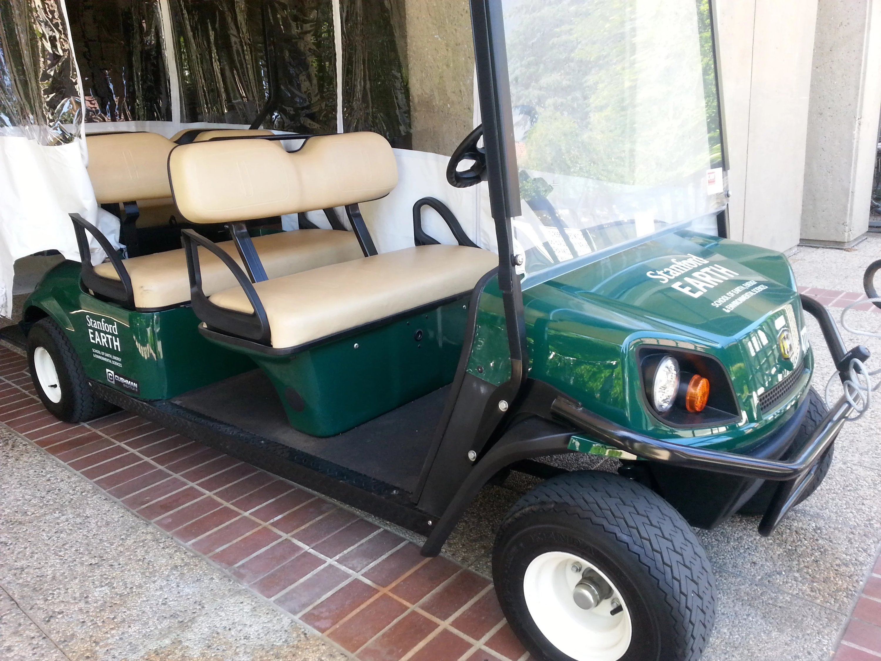 A green electric golf cart.