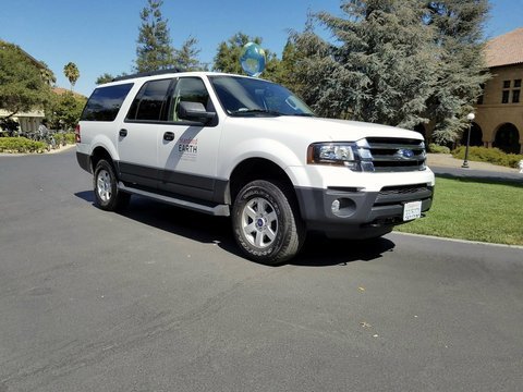 A large white SUV-type vehicle